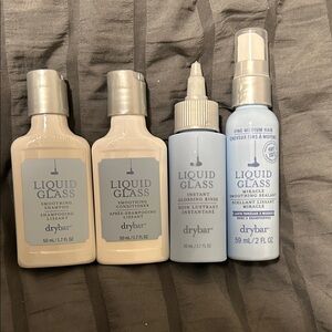 Drybar Liquid Glass Hair Care Collection - sizes are 50mL to 59mL (used once)